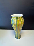 Contemporary High Japanese Reed Glass Vase from Oljos Glass. With maker's mark and signed. The exterior is finished in embossed glass in a combination of shades of green. New in a giftbox